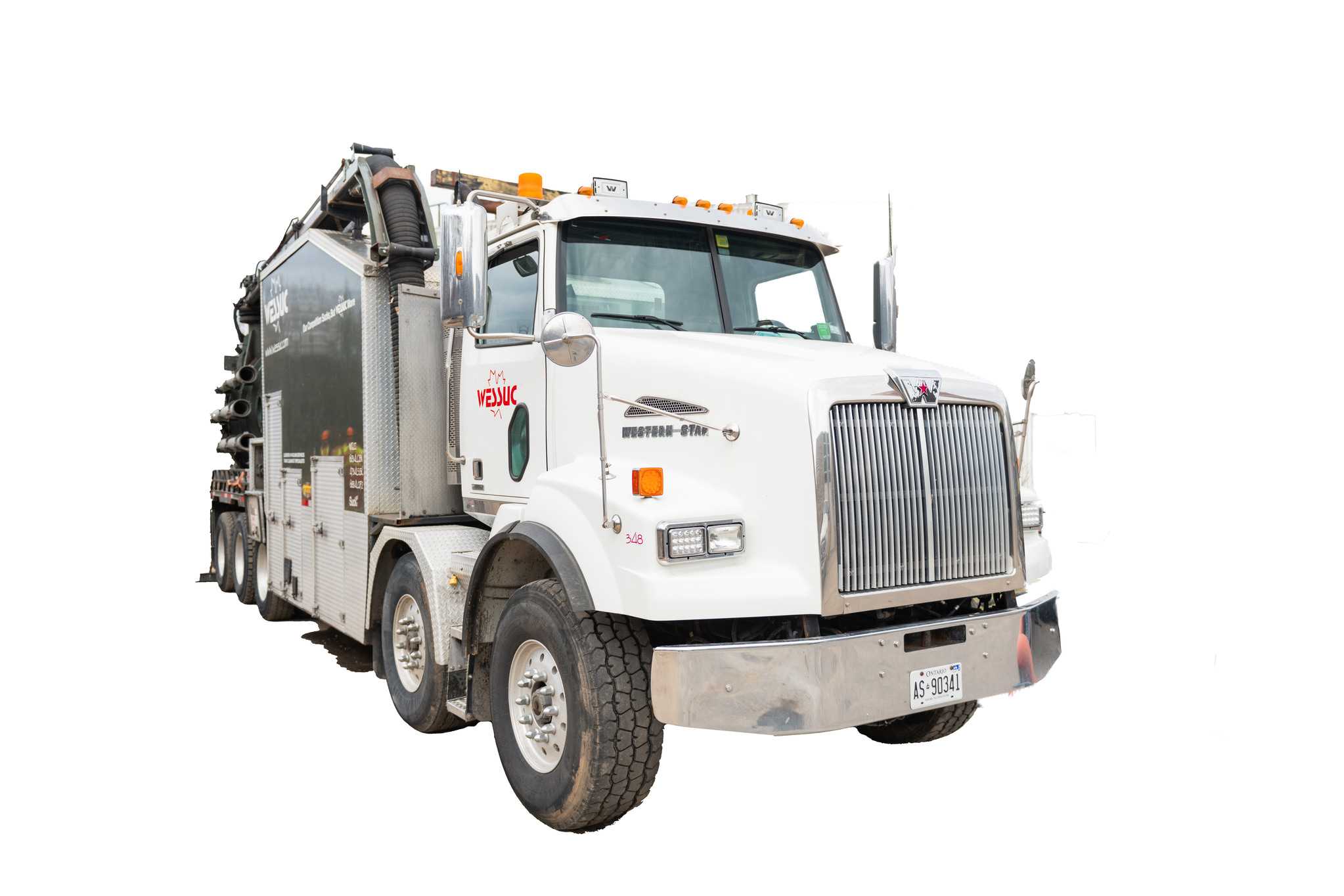 white and green vac truck