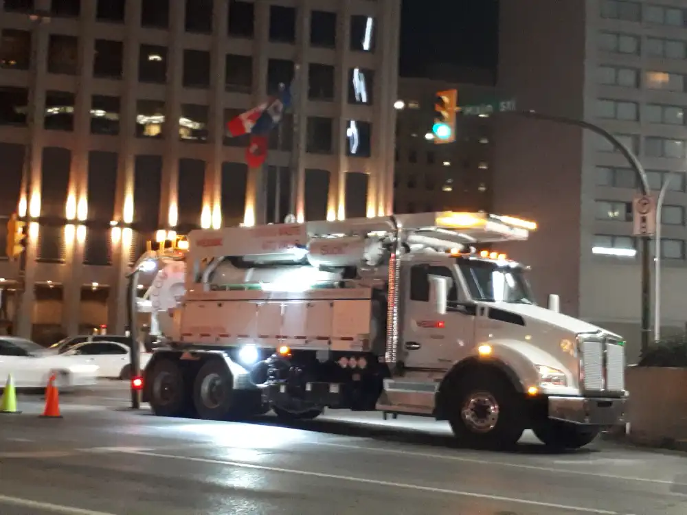 Flusher working at night