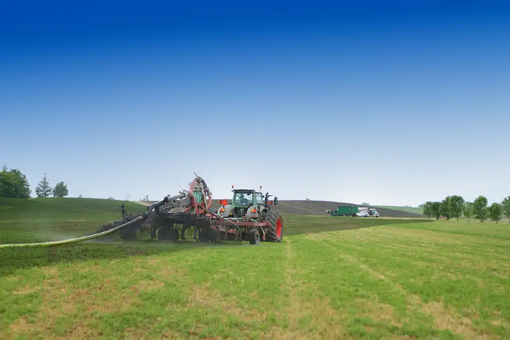 Tractor top spreading biosolids